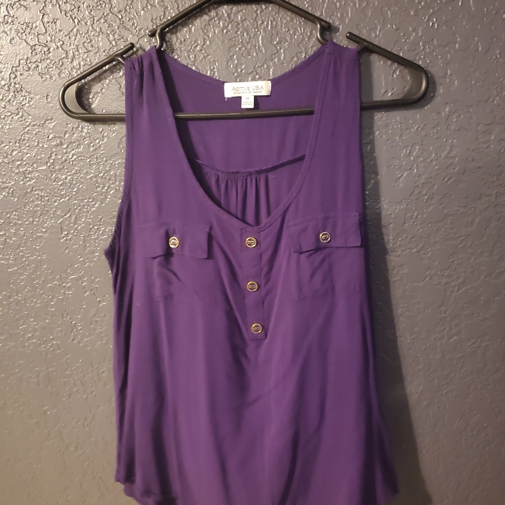 Purple sleeveless blouse with pockets
